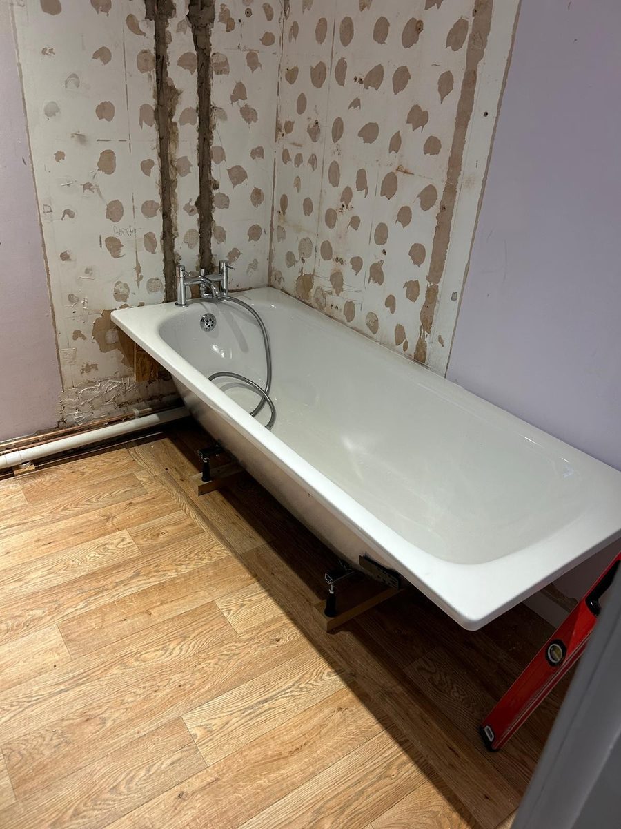 Bath installation in progress by DM Heating and Cooling, Gas Safe registered engineers in Kent