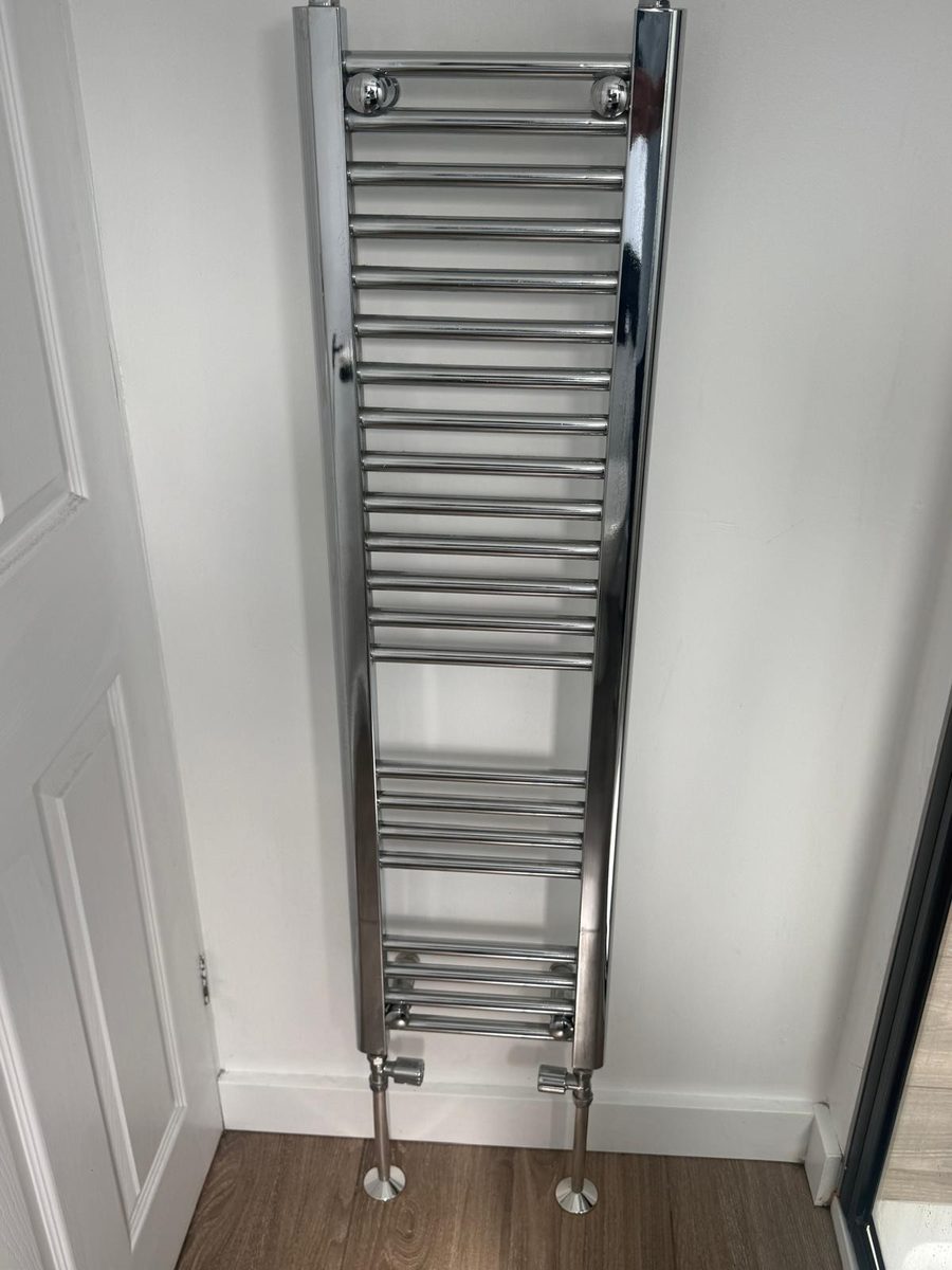 Heated towel rail installation completed by DM Heating and Cooling, Gas Safe registered engineers in Kent